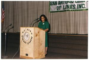 Woman in Green at Salute to Youth Awards Program