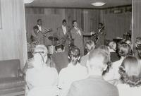 Lambda Chi Alpha (LXA) fraternity house party with musicians, 1957