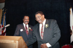 Willie Williams standing at a lectern, Los Angeles, 1992