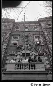 Umoja (Black student union) activists look out from balcony of occupied administration building, Boston University