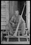 Old Negro (former slave) Willis Winn with horn with which slaves were called. Near Marshall, Texas