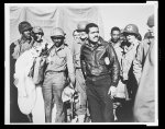 Making a name Members of the 99th Fighter Group of the Army Air Forces, famous all-negro outfit, who are rapidly making themselves feared by enemy pilots, pose for a picture at the Anzio beachhead.