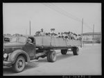 [Untitled photo, possibly related to: Corpus Christi, Texas. Truckload of Mexican and Negro farm laborers]