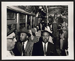 [Martin Luther King, Jr., and Ralph Abernathy riding on the first desegregated bus, Montgomery, Alabama]