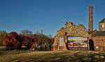 A mural, adapted from a drawing by William Waud that appeared in Harper's Magazine during the U.S. Civil War of the 1860s, stands near the railroad tracks in the venerable and recently (as of 2019) reviving Old Towne neighborhood in Petersburg, Virginia, it depicts the city waterfront on the Appomattox River at that time