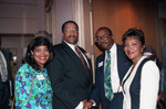 Willie Williams posing with others at an event to welcome him, Los Angeles, 1992