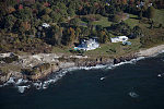 An October 2017 aerial view of a fine home on the Cod Rocks, a good example of Maine's rocky Atlantic coast, near Higgins Beach