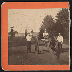 [Nicholas G. Wilson, National Cemetery superintendent, and others with Civil War cannon at Soldier's National Cemetery, Gettysburg, Pennsylvania]