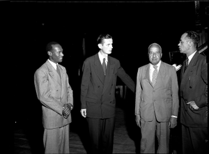 Dr. Robert Stevenson, pianist and other unidentified men at HU [Howard University] May 1949 [cellulose acetate photonegative]