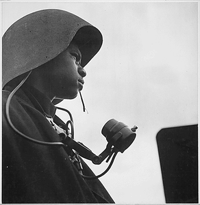 "Richard Salter, CK 3/c, a talker of a gun station, aboard the U.S.S. Tulagi (CVE-72) off the coast of southern France."