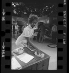 NBC's Studio 9 janitress, Anita Taylor dusting during filming of "Days of Our Lives" in Burbank, Calif., 1972