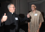 Thumbnail for Robert A. Wild shares a laugh with Maurice ""Bo"" Ellis during Alumni Reunion Weekend at Marquette, 2007