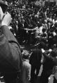 Robert F. Kennedy walking through the crowd at Martin Luther King, Jr.'s funeral.