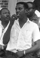 Stokely Carmichael addressing a crowd in front of the Neshoba County Library in Philadelphia, Mississippi, during the "March Against Fear" begun by James Meredith.