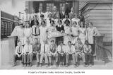 Students and teacher on steps of Brighton School, Seattle, June 1929