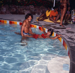 Thumbnail for G. C. Cameron and Gwen Gordy Fuqua in the pool during a party, Los Angeles