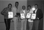 The Coasters posing with awards at the Pied Piper nightclub, Los Angeles, 1989