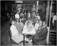 "High Hat," dance and party, African-American party, on Auburn Avenue, Atlanta, Georgia, January 21, 1943. Photo shoot commissioned by fashion and home-goods mail-order merchandizer, Chicago Mail Order Company, owned by Alden's