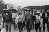 Thumbnail for John Lewis (far left) and other marchers during the 20th anniversary reenactment of the Selma to Montgomery March, probably in rural Dallas or Lowndes County, Alabama.